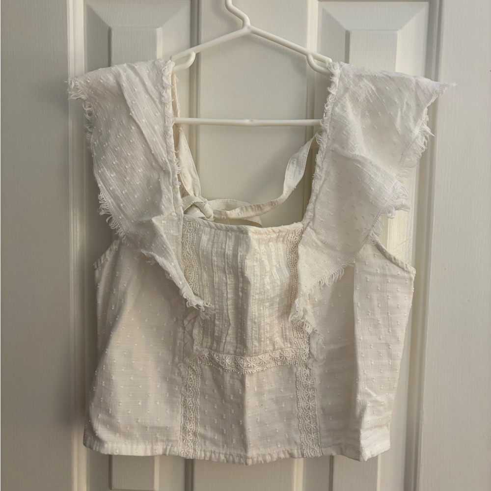 Off white colored top